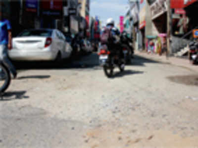 Commercial Street potholes burn a hole in traders' pockets