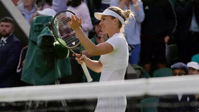 Former Wimbledon champion Simona Halep advances to third round