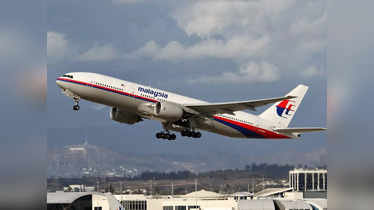 Where did the Malaysian flight with 239 passengers disappear?