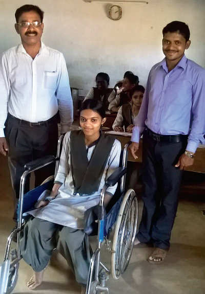 Girl on wheels gets 90 per cent in PU exam
