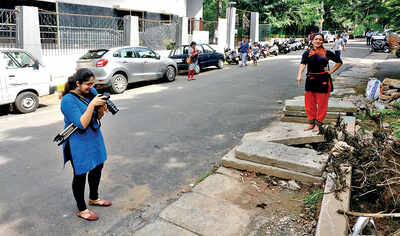 Wondering how to walk down the broken footpaths of Bengaluru's Malleshwaram? Well, just dance through it