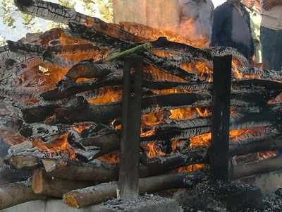 Police remove woman's body from pyre to probe cause of death