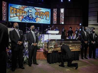 'Get your knee off our necks!': George Floyd mourned in Minneapolis