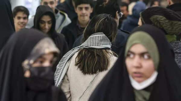 Their hair long and flowing or in ponytails, women in Iran flaunt their locks