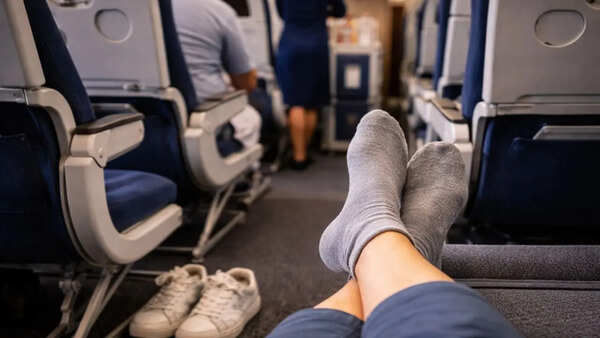 Why you should never go barefoot on a plane and always wear socks