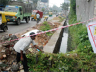 BBMP begins covering up open drains