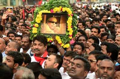 DMK patriarch M Karunanidhi laid to rest on the Marina; family accord tearful farewell