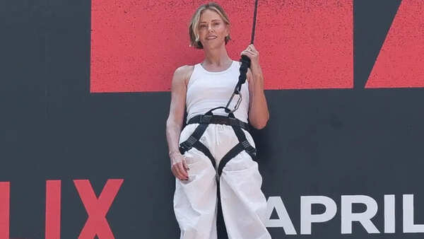 Believe it or not: Charlize Theron takes promos to new heights, literally
