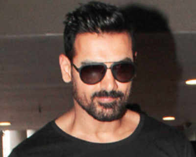 John Abraham says it with a T-Shirt