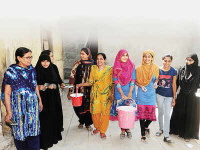 Clad in burkhas, 17 women take house painting as a profession in Ahmedabad