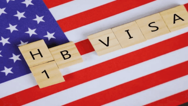 Green card? H-1Bs must prove worthy of ‘status adjustment’
