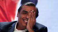 Why Asia’s richest man Mukesh Ambani is on a shopping spree in race against Amazon 