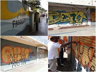 Graffiti against BJP, CAA, NRC appeared on Church Street walls; BJP supporters covered with saffron paint