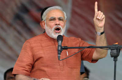 Narendra Modi challenges PM for debate on development