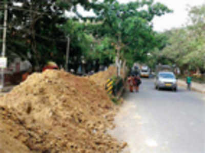 Yet again, a newly asphalted road is dug up