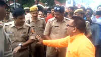 BJP leader loses temper after police caught him without helmet on bike 