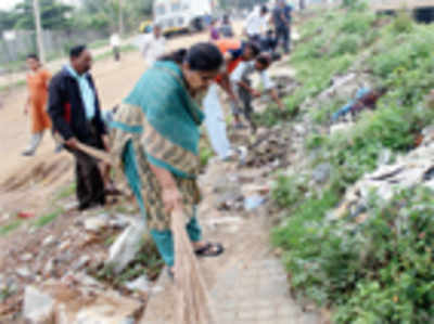 HBR residents sweep, dig and paint to fix black spot