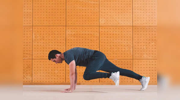 Jumping jacks and squat, curl, press