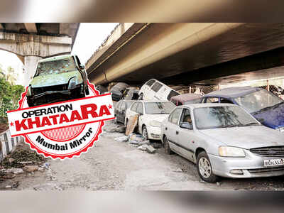 Pile of old cars blocks traffic on Western Express Highway