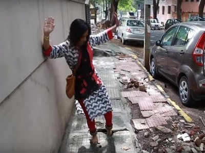 Woman trips on broken Shanthinagar pavement