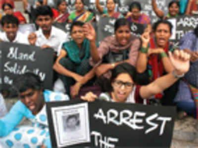 Activists protest delayed arrest of rape accused