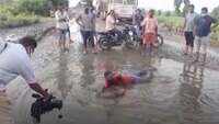 CPI(M) workers swim in potholes to demonstrate anguish against Andhra Pradesh govt 
