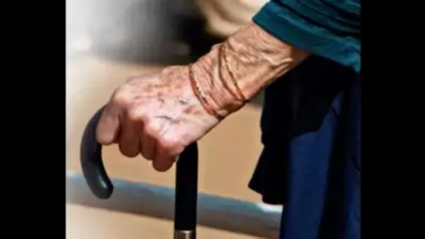 No road to village, ailing elderly woman carried in bedsheet