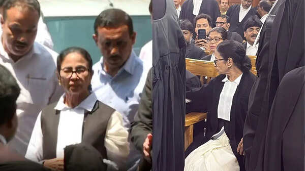 Bengal post-poll violence: Mamata Banerjee dons lawyers' coat, arrives at Calcutta high court