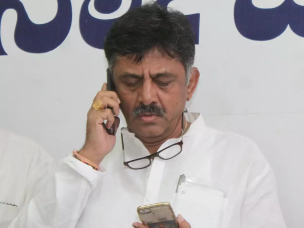 Karnataka Congress chief D K Shivakumar hits man for trying to put his arms around him
