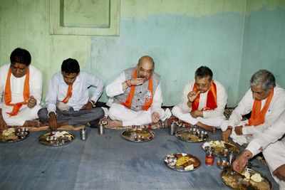 Amit Shah on door to door campaign to woo tribals in poll-bound Gujarat