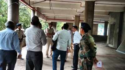 Army personnel secure Adarsh building