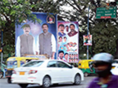 Regularise illegal ad hoardings for Rs 1 lakh