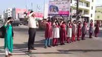 In Nalgonda town, the national anthem is played everyday and people stop to pay respect 