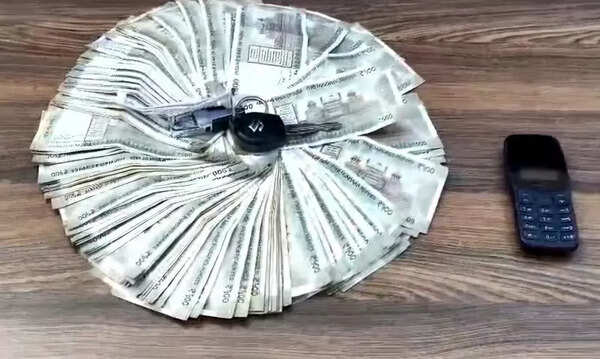 Two arrested for theft of 2L in cash