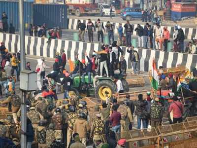 Farmers break police barricade at Tikri border, tractor rally enters Delhi