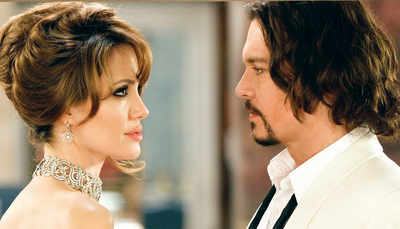 Jolie seeks comfort in Johnny Depp after Brad split