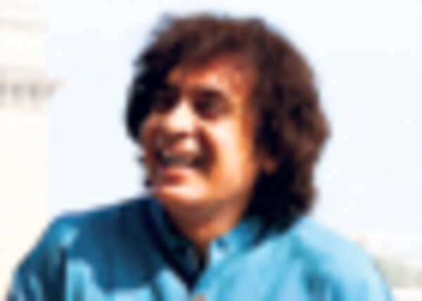 One for Indian classical music: Zakir Hussain