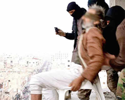 ISIS militants push Syrian off building for being gay - then stone body