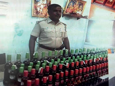 Liquor firm exec had 7 cases of vodka at home