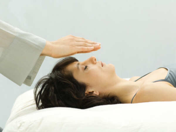 Here’s what you should know about Reiki