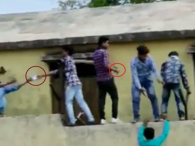 Watch: Men climb boundary wall of school in Yavatmal to pass chits to students during exam