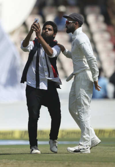 Debutant Shardul injured; Man tries to kiss Virat Kohli as West Indies slump to 86-3 at lunch on Day 1 at Hyderabad