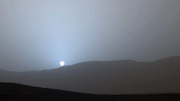 Why do sunsets on Mars glow blue despite the planet being red