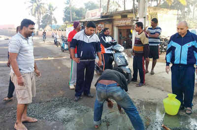 Residents take up road repair work as civic body remains apathetic