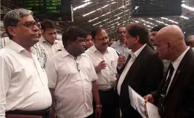 Senior railway officers inspect coaches, stations