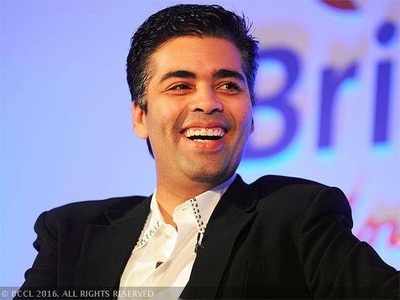 Karan Johar feels enormously blessed to be a parent of twins