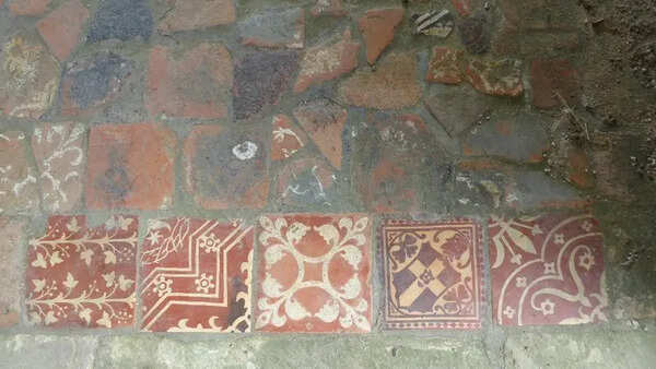 A biscuit tin secret comes to light as a former thief returns medieval tiles after sixty years