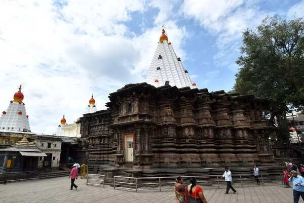 Cool coating at Kolhapur’s Mahalaxmi temple premises to provide relief to devotees arriving for darshan