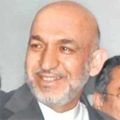 Karzai offers Hamid Karzai role in govt