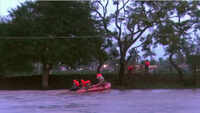 Fire officials rescue villagers stranded in floodwater in Karnataka’s Dharwad 
